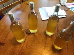 Bottles of mead on a wooden table
